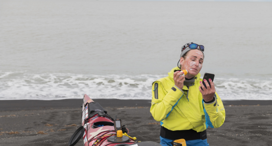 Veiga Grétarsdóttir preparing to kayak around the coast of Iceland in Against the Current, a film by Óskar Páll Sveinsson.