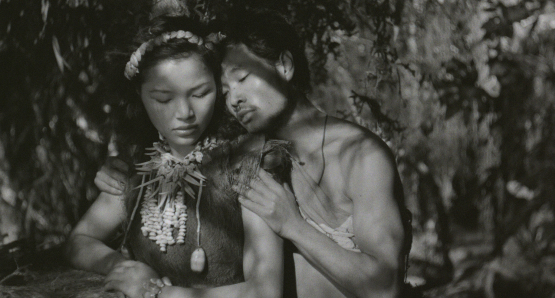 Keiko, the “Queen Bee” of Anatahan (Akemi Negishi) with one of her numerous suitors in Josef von Sternberg's ANATAHAN