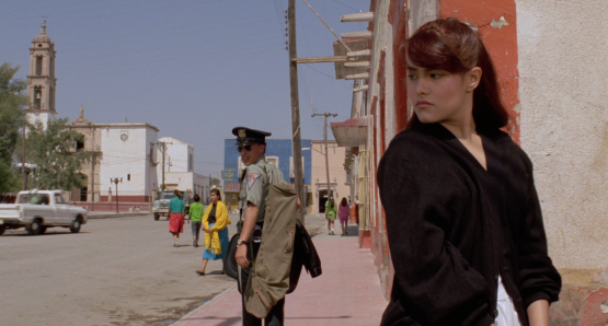 Roberto Sosa as Pedro and Vanessa Bauche as Maribel in Alex Cox's HIGHWAY PATROLMAN.