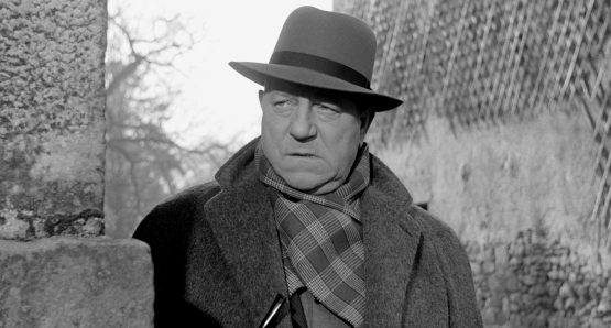 Jean Gabin as Inspector Jules Maigret in MAIGRET AND THE ST. FIACRE CASE.