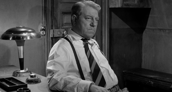 Jean Gabin as Inspector Jules Maigret in MAIGRET SETS A TRAP.