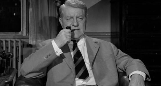 Jean Gabin as Inspector Jules Maigret in MAIGRET SETS A TRAP.