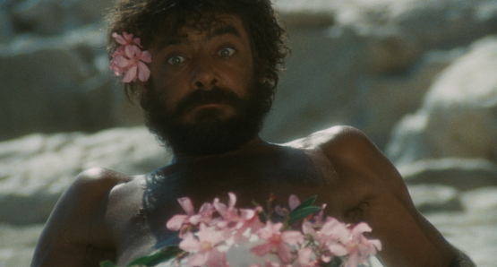 Giancarlo Giannini as Gennarino Carunchio in SWEPT AWAY.