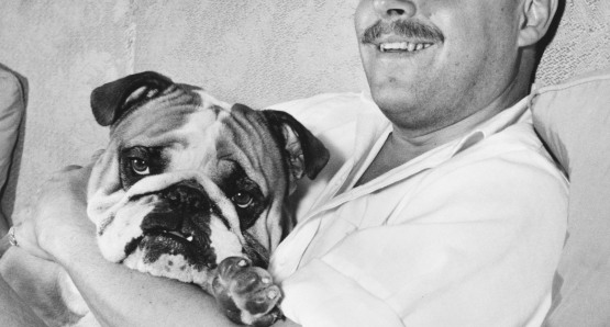 Tennessee Williams with one of his bulldogs, courtesy of Harry Ransom Center / The University of Texas at Austin